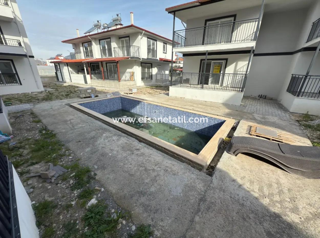 1 1 Spacious Brand New Apartment For Sale In A Complex With Pool Close To The Center Of Ortaca.